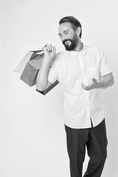 It is bargain. Bearded man with shopping bags. Happy holidays. shopping. big sale in shopping mall. Mature hipster with beard. brutal caucasian hipster with moustache. Incredible time while shopping — Stock Photo, Image