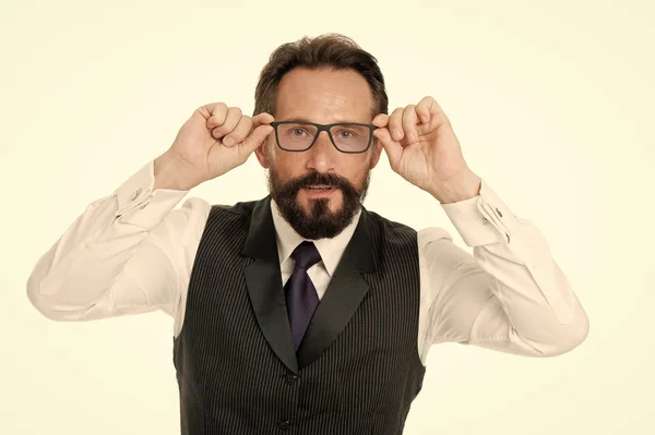 Man bearded wear eyeglasses isolated white. Businessman teacher adjust eyeglasses. Take look concept. Business analysis and analytical skills. Eyeglasses optics and vision check. Take look carefully