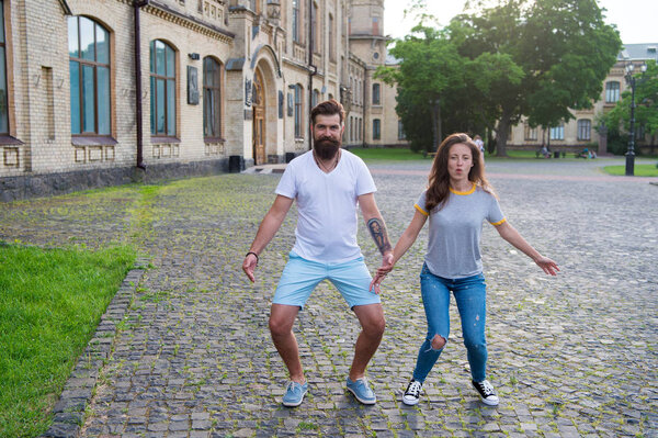 Loving heart is truest wisdom. Summer vacation. Fall in love. Happy together. Couple in love walking having fun. Couple relaxing enjoying each other. Man bearded hipster and pretty woman in love