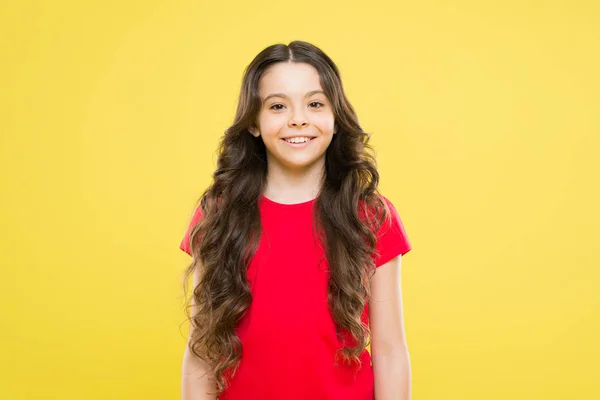 Little girl grow long hair. Teen fashion model. Styling curly hair. Change you can see. Hairdresser tip. Kid girl long healthy shiny hair. Perfect curls. Kid cute face with adorable curly hairstyle — Stock Photo, Image
