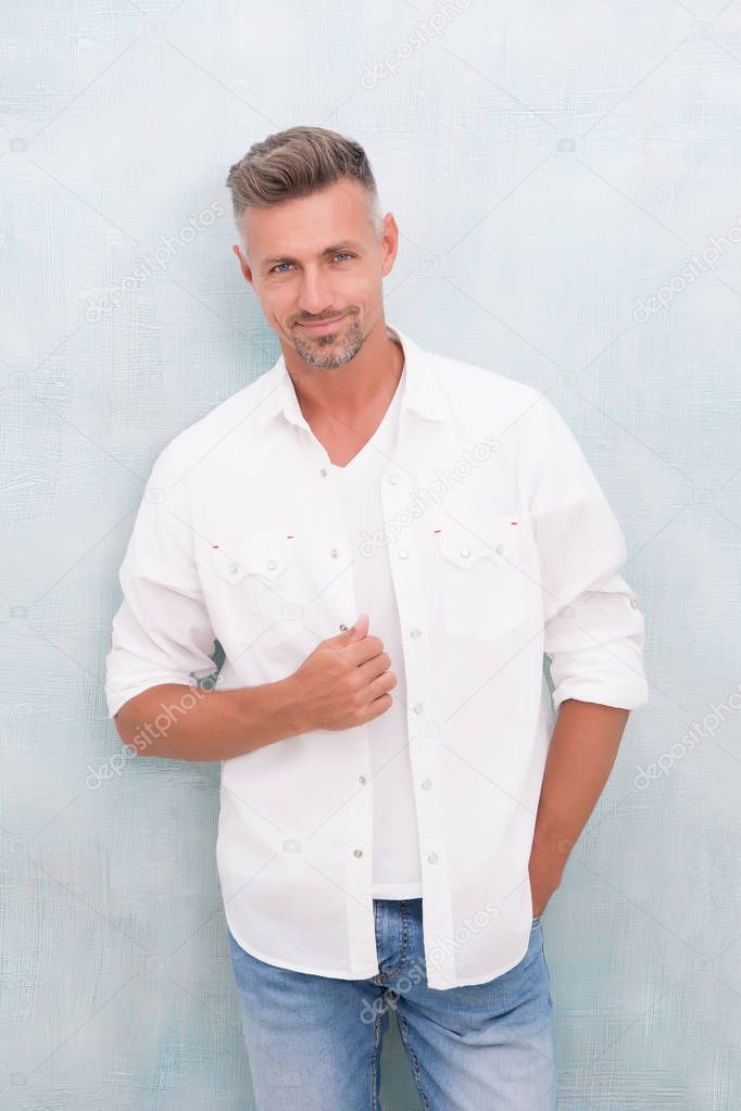 Fashion concept. Man model clothes shop. Mature man model. Feeling comfortable day by day. Menswear and fashionable clothing. Man looks handsome in casual shirt. Guy with bristle wear casual outfit