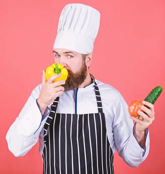 Buy fresh vegetables grocery store. Vegetarian restaurant. Hipster chief chef vegetarian cafe. Choose vegetarian lifestyle. Man cook hat apron hold fresh vegetables. Vegetarian recipe concept — Stock Photo, Image