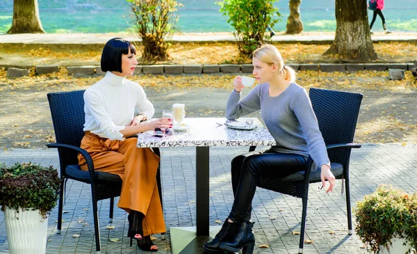 Togetherness and female friendship. Trust her. Girls friends drink coffee and enjoy talk. True friendship friendly close relations. Conversation of two women cafe terrace. Friendship meeting — Stock Photo, Image