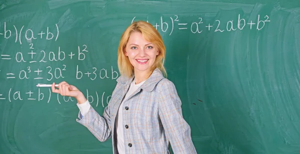 She likes her job. Back to school concept. Working conditions which prospective teachers must consider. Woman smiling educator classroom chalkboard background. Working conditions for teachers — Stock Photo, Image