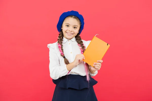 Preparing activity book writing. Reading skills. Study language. Interesting story. Adorable little girl with school exercise book. Achieve knowledge. Education concept. Cute small child holding book — Stock Photo, Image