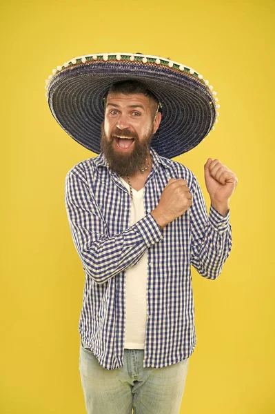 Mexican culture concept. Celebrate mexican holiday. Mexican bearded guy ready to celebrate. Customs and traditions. Sombrero wide brimmed hat provides plenty of shade. Man wear sombrero mexican hat