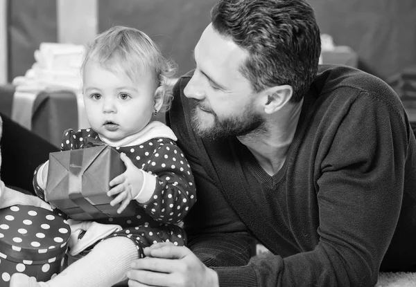 Fathers day holiday. Shopping online. Boxing day. Love and trust in family. Bearded man with little girl. Happy family with present box. father and doughter child. Valentines day. Red boxes