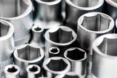 soket anahtarının metallize arka planı. mükemmel araç kiti. Krom Vanadyum Çelik. metallized düzeltme ekipmanları. soket anahtarı. Kral Tamirci. profesyonel araçlar seti