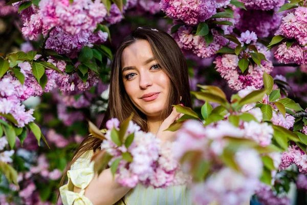 Soft and tender. Natural cosmetics for skin. Floral paradise. Girl in cherry blossom flower. Sakura tree blooming. Cosmetics concept. Gorgeous flower and female beauty. Woman in spring flower bloom