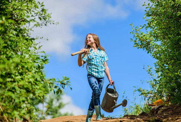 Family bonding. spring country side village. future success. little girl on rancho. summer farming. farmer little girl. garden tools, shovel and watering can. kid worker. I love gardening — Stock Photo, Image