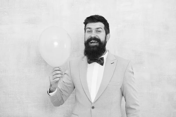 Lets have fun. Man groom blue tuxedo bow tie hold air balloon. Wedding fun. Groom bearded hipster having fun with air balloon. My happy day. Happy guy in cheerful mood. Fun and happiness concept — Stock Photo, Image