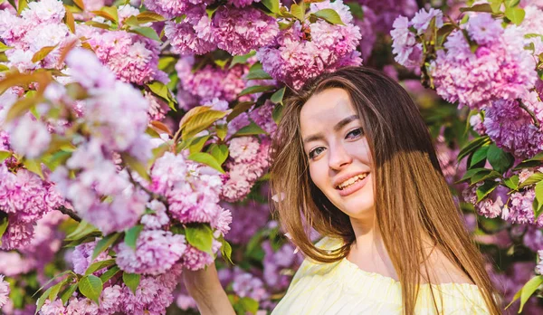 Soft and tender. Gorgeous flower and female beauty. Woman in spring flower bloom. Natural cosmetics for skin. Floral paradise. Girl in cherry blossom flower. Sakura tree blooming. Cosmetics concept — Stock Photo, Image