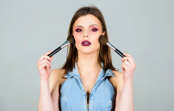 Makeup dark lips. Attractive woman applying makeup brush. Professional makeup supplies. Makeup artist concept. Girl apply powder eye shadows. Hiding imperfections. Looking good and feeling confident — Stock Photo, Image