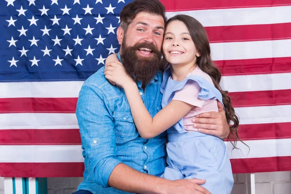 United we stand. United family. Happy family celebrating independence day of the united states. Father and little daughter enjoying unity and love. United in what they believe
