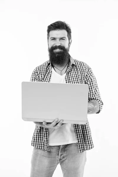 Happy man with notebook. Searching for new job. Bearded man using notebook. Bearded happy man surfing inet on notebook. Job searching. I need job. Best offer. Job search. In search of inspiration