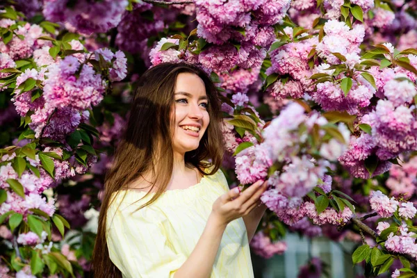 Soft and tender. Gorgeous flower and female beauty. Woman in spring flower bloom. Natural cosmetics for skin. Floral paradise. Floral shop. Girl in cherry blossom flower. Sakura tree blooming — Stock Photo, Image