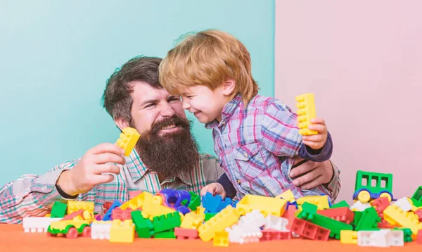We like spending time together. small boy with dad playing together. happy family leisure. building with constructor. child development. father and son play game. vacation time. free time on vacation — Stock Photo, Image