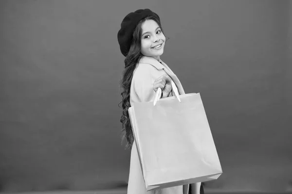 Get discount shopping on birthday holiday. Nice purchase. Fashionista enjoy shopping. Customer satisfaction. Prime time buy spring clothing. Obsessed with shopping. Girl cute kid hold shopping bags — Stock Photo, Image