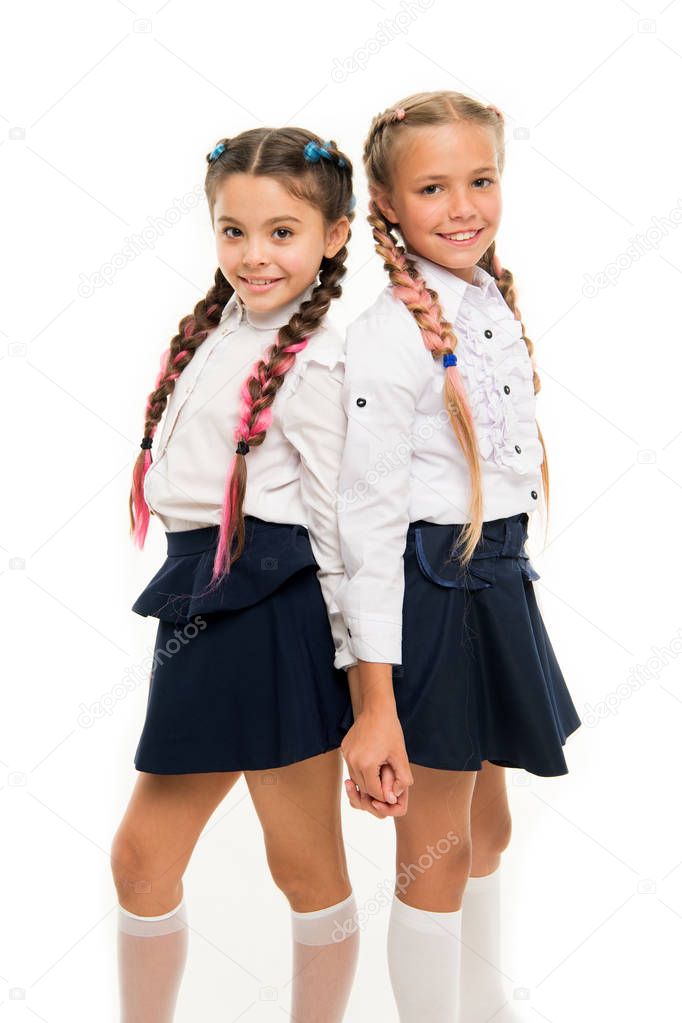 Appropriate hairstyle. Girls long braids. Fashion trend. It is awesome dye hair fun colors. Keep hair braided for tidy look. Pupils with long braided hair. Hairdresser salon. Hairstyles school style