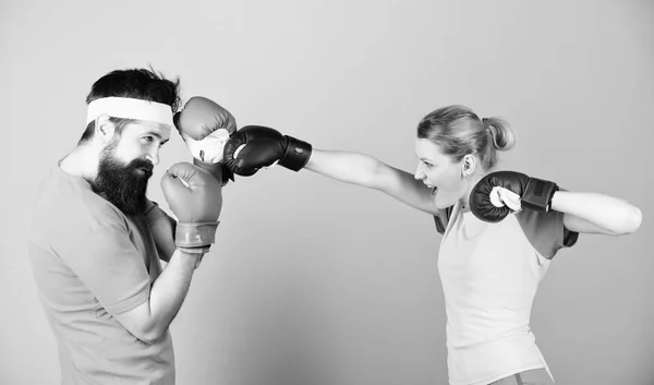 Boxing sport concept. Couple girl and hipster practicing boxing. Sport for everyone. Amateur boxing club. Equal possibilities. Strength and power. Ready to fight. Man and woman in boxing gloves — Stock Photo, Image