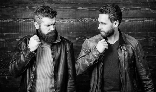 Men brutal bearded hipster posing in fashionable black leather jackets. Handsome stylish and cool. Feel confident in brutal leather clothes. Brutal men wear leather jackets. Leather fashion menswear — Stock Photo, Image