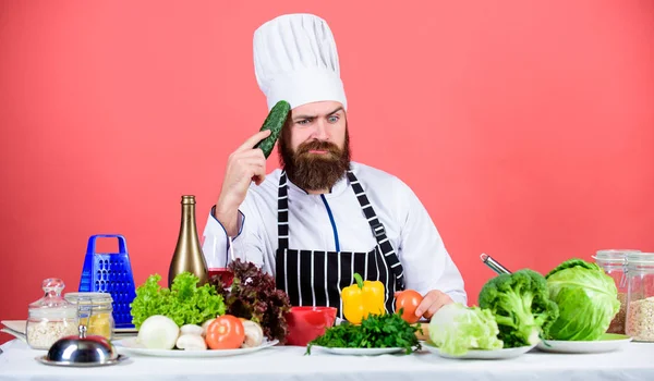 Delicious supper. Bearded man cook in kitchen, culinary. Healthy food cooking. Dieting and organic food, vitamin. Vegetarian. Mature chef with beard. Chef man in hat. Secret taste recipe — Stock Photo, Image