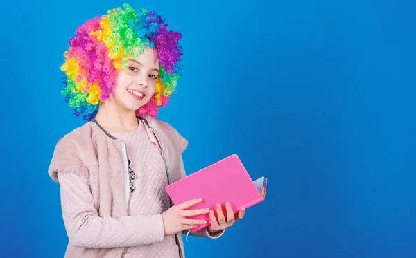 Reading is fun. Adorable little girl enjoy reading a book. Cute small child holding book for home reading. Reading in spare time, copy space — Stock Photo, Image