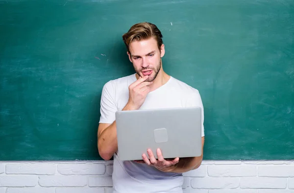 Handsome man use modern technology. Digital technology. Apply online course for programmers. Programming web development. Student learn programming language. School teacher programming with laptop — Stock Photo, Image