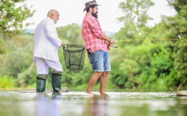 hobi ve rekreasyon. Başarı. büyükbaba ve drandson balıkçılık. emekli işadamı. erkek arkadaşlığı. Fikir para çekiyor. Balıkçı. işadamı Fisher emekliliği kutluyor. yeni emekli hayatı