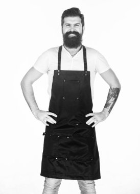 Mutlu gülümsemem kalplerinizi ısıtsın. Berber giyen ya da önlük pişiren mutlu adam. Sakallı adam önlükte mutlu gülümsüyor. Traşsız yüzünde mutlu bir gülümseme ile Acımasız hipster