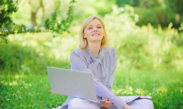 Become successful freelancer. Woman with laptop sit on rug grass meadow. Online freelance career concept. Pleasant occupation. Guide starting freelance career. Business lady freelance work outdoors