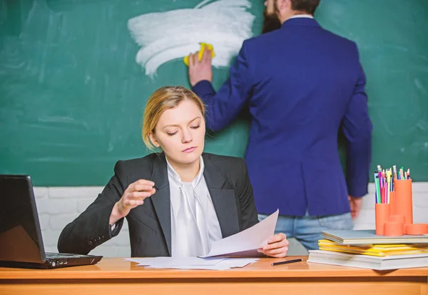 Starting to learn more. businessman and secretary. paper work. office life. business couple use laptop and documents. teacher and student on exam. back to school. formal education. Doing her homework — Stock Photo, Image