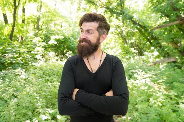 Summer heat season. Wild nature. Man bearded hipster bright foliage background. Guy relax in forest. Exploring nature. Handsome man with beard and mustache in nature. Brutality of jungles concept — Stock Photo, Image