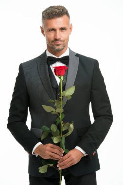 Sevgililer günü ve yıldönümü. Tanışma Hizmetleri. Nasıl romantik olmak. Romantik bir beyefendi. Adam romantik hediye ile emin Macho olgun. Yakışıklı adam çiçek romantik bir tarih gül. Mükemmeliyetçi konsept