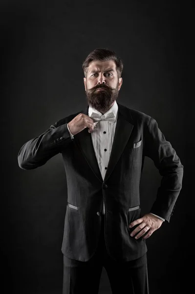 Hipster formal suit tuxedo. Difference between vintage and classic. Official event dress code. Classic style. Menswear classic outfit. Bearded man with bow tie. Well dressed and scrupulously neat