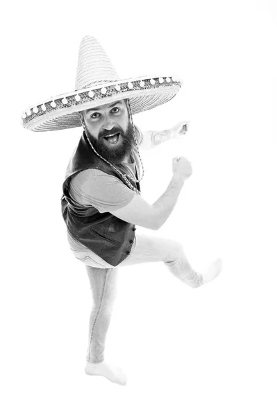 Mexican energetic temper. Man bearded cheerful guy wear sombrero mexican hat. Mexican party concept. Celebrate traditional mexican holiday. Guy happy cheerful face having fun dancing and jumping — Stock Photo, Image