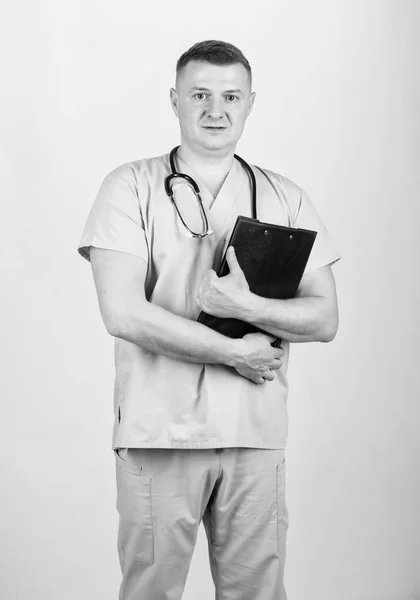 Nurse laboratory assistant. family doctor. confident doctor with stethoscope. medicine and health. man in medical uniform. Treatment prescription. pediatrician intern. Medical tool. nurse with folder — Stock Photo, Image