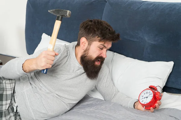 Catch up on missed sleep during weekend. Morning awakening. Man awake unhappy with alarm clock ringing. Although you are asleep you may wake up feeling like did not sleep at all. Stages of sleep — Stock Photo, Image