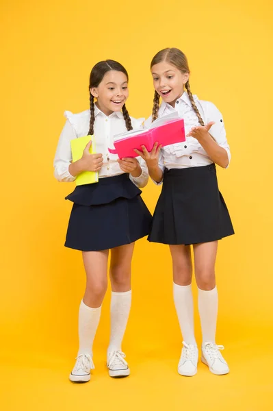 Diary writing for kids. reading and writing. back to school. Classmates at book store or library. project work together. literature lesson. happy girls study with notepad. small girls kids with book — Stock Photo, Image