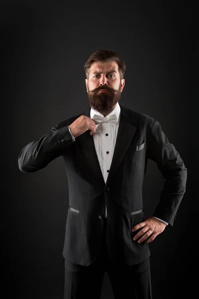 Hipster formal suit tuxedo. Difference between vintage and classic. Official event dress code. Classic style. Menswear classic outfit. Bearded man with bow tie. Well dressed and scrupulously neat