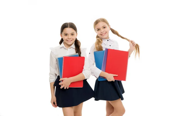 These books come from the library. Adorable library readers. Cute little schoolgirls holding library books. Small primary school children taking books from school library — Stock Photo, Image