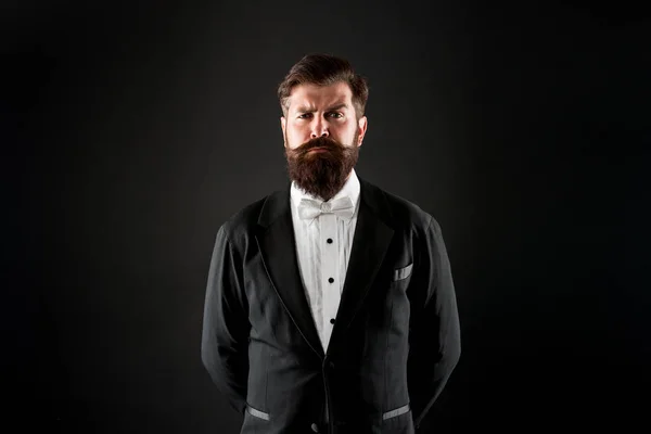 Official event dress code. Male fashion. Classic style. Classic never out of trend. Menswear classic outfit. Bearded man with bow tie. Well dressed and scrupulously neat. Hipster formal suit tuxedo