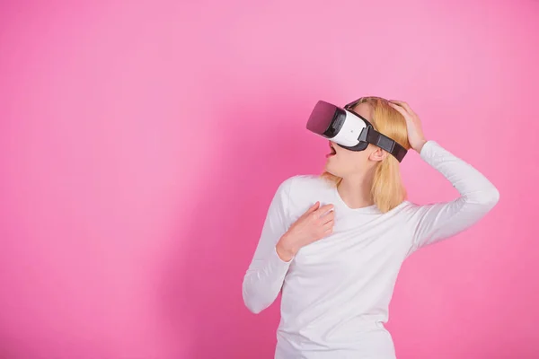Woman using virtual reality headset. Young woman using a virtual reality headset with conceptual network lines. Young woman using a virtual reality headset. Future data.