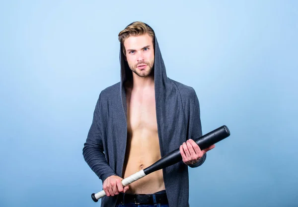 Sport equipment. Sportsman strong macho looks threatening with bat. Bully mood. Bad boy concept. Man handsome bully guy with baseball bat. Strong and confident. Aggression masculinity strong temper — Stock Photo, Image