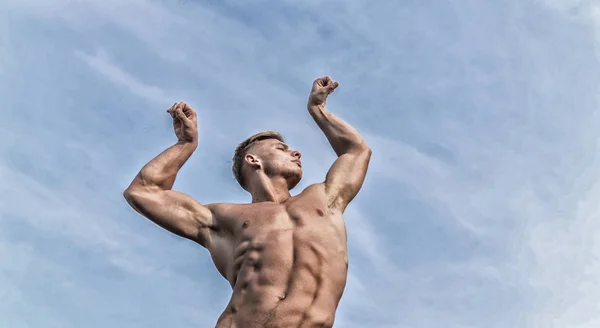 Man muscular athlete bodybuilder show muscles. Bodybuilder shape. Sexy torso attractive body. Strong muscles emphasize masculinity sexuality. Man muscular chest naked torso stand sky background — Stock Photo, Image