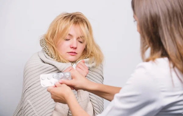 She can rely to this doctor. Patient care and healthcare. Doctor visiting unhealthy woman at home. Medical doctor examining patient. Primary care doctor making diagnosis to sick woman