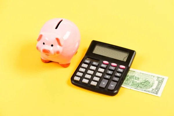 only cash. planning and counting budget. moneybox with calculator. Piggy bank. income capital management. bookkeeping. financial problem. money saving. Accounting and payroll