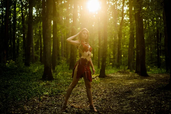 stock image Female spirit mythology. She belongs tribe warrior women. Wilderness of virgin woods. Wild attractive woman in forest. Folklore character. Living wild life untouched nature. Sexy girl. Wild human