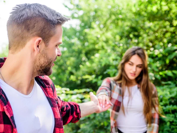 trust me. man in selective focus with girl in park. couple in love. family weekend. romantic date. happy valentines day. summer camping in forest. couple first meet outdoor. Relations