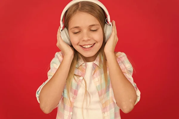 Girl child listen music modern headphones. Get music account subscription. Enjoy music concept. Music always with me. Little girl listen song headphones. Online radio station channel. Leisure concept